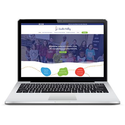 Leader Valley website on laptop